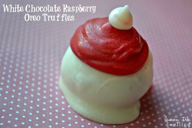 Oreo Truffles flavored with raspberry extract and decorated to look like adorable little Santa hats!