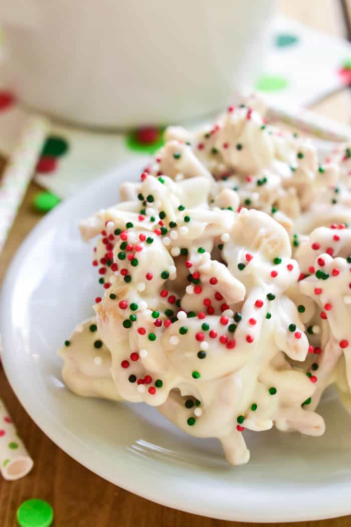 White Chocolate Ting-a Lings are one of our favorite holiday treats! Loaded with salty peanuts and crunchy chow mein noodles, then smothered in white chocolate and decorated with red, green & white Christmas sprinkles, they're the perfect salty-sweet no-bake treat. 