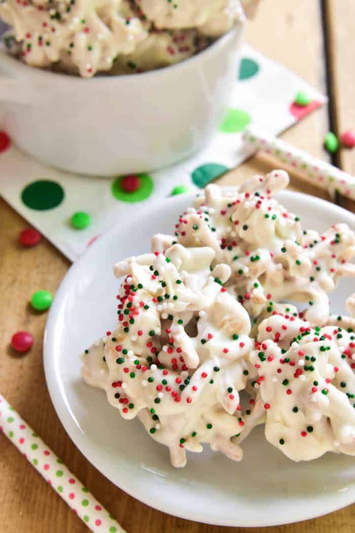 White Chocolate Ting-a Lings are one of our favorite holiday treats! Loaded with salty peanuts and crunchy chow mein noodles, then smothered in white chocolate and decorated with red, green & white Christmas sprinkles, they're the perfect salty-sweet no-bake treat. 