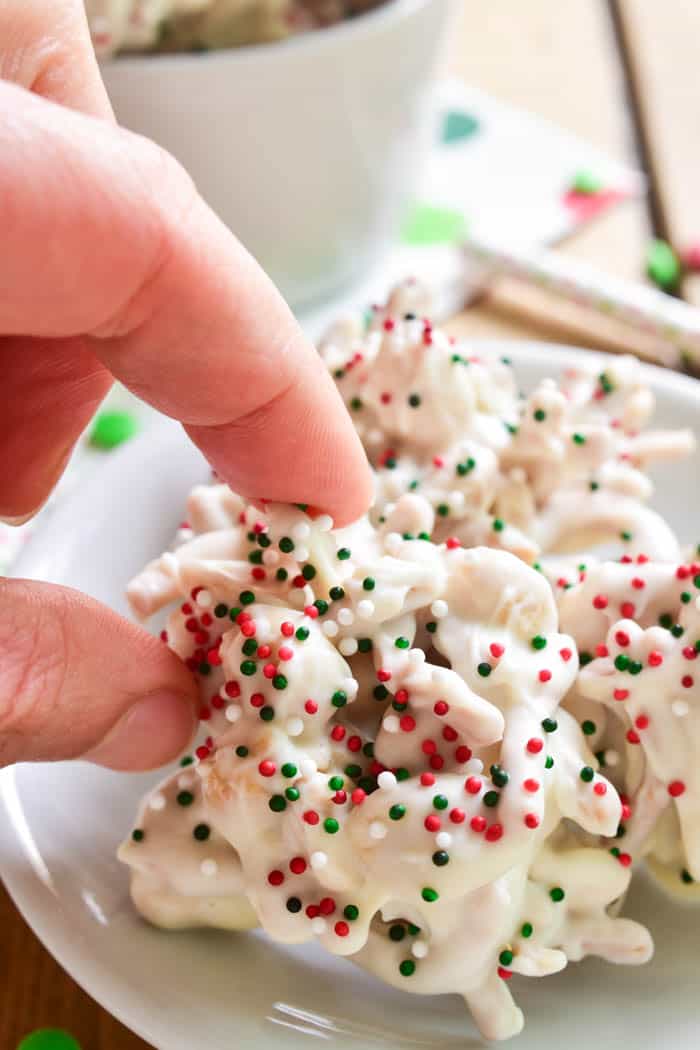 White Chocolate Ting-a Lings are one of our favorite holiday treats! Loaded with salty peanuts and crunchy chow mein noodles, then smothered in white chocolate and decorated with red, green & white Christmas sprinkles, they're the perfect salty-sweet no-bake treat. 