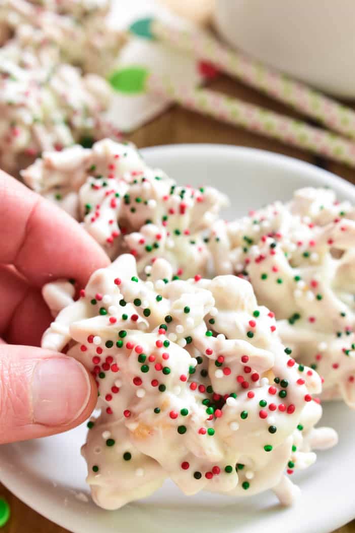 White Chocolate Ting-a Lings are one of our favorite holiday treats! Loaded with salty peanuts and crunchy chow mein noodles, then smothered in white chocolate and decorated with red, green & white Christmas sprinkles, they're the perfect salty-sweet no-bake treat. 