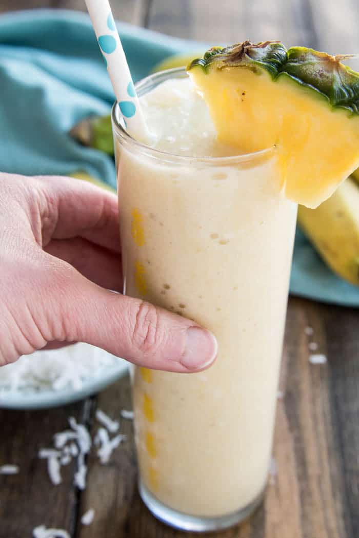 Banana Colada Smoothies - all the flavors of a pina colada, with the delicious addition of banana, in a tasty treat the whole family can enjoy!