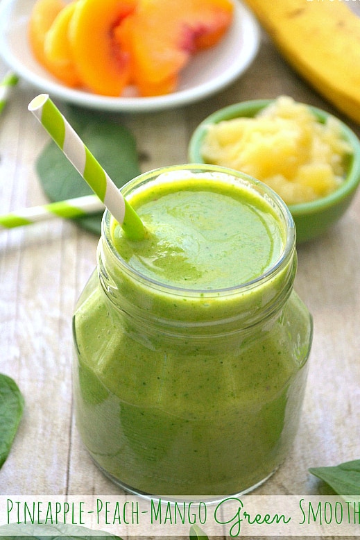 This Pineapple Peach Mango Green Smoothie is a delicious taste of the tropics! Loaded with peaches, mango, pineapple juice, bananas, and spinach....this smoothie is flavor-packed and perfect for any time of day! 