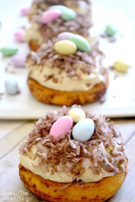 These Easter Cinnamon Rolls are the PERFECT breakfast for Easter morning! They start with refrigerated cinnamon rolls, topped with the best cream cheese frosting, chocolate coconut, and Jordan almonds for a super cute, sweet breakfast treat!
