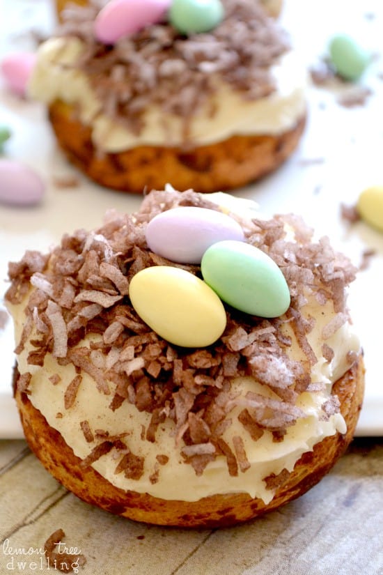 These Easter Cinnamon Rolls are the PERFECT breakfast for Easter morning! They start with refrigerated cinnamon rolls, topped with the best cream cheese frosting, chocolate coconut, and Jordan almonds for a super cute, sweet breakfast treat!