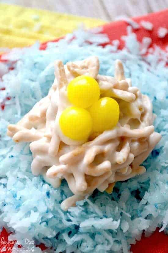 These Lemon Birds' Nest Treats are the perfect sweet treats for Easter! Made with crunchy chow mein noodles covered in lemony white chocolate and topped with 3 Lemonhead birds' eggs, they're cute, simple, and delicious!