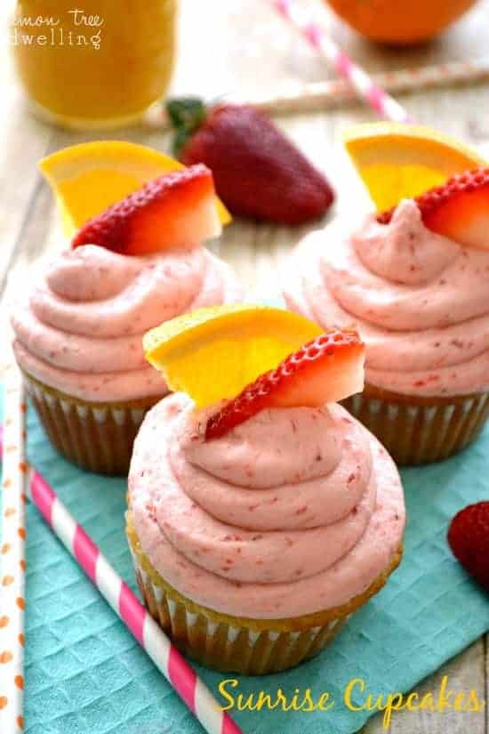 Sunrise Cupcakes! Filled with homemade orange curd and topped with fresh strawberry buttercream. SUCH a delicious combination!