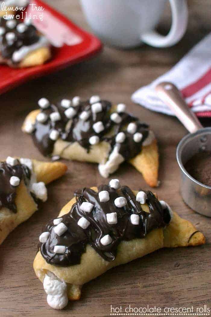 Hot Chocolate Crescent Rolls - stuffed with sweet hot chocolate cream cheese and marshmallow fluff and drizzled in milk chocolate and more marshmallows! 