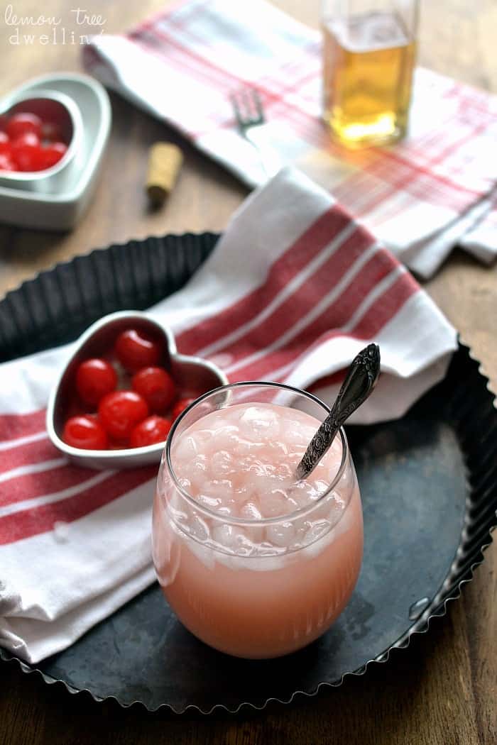 Amaretto Sunrise - a deliciously sweet cocktail made with homemade amaretto, triple sec, and grenadine. Perfect for Valentine's Day or just because!