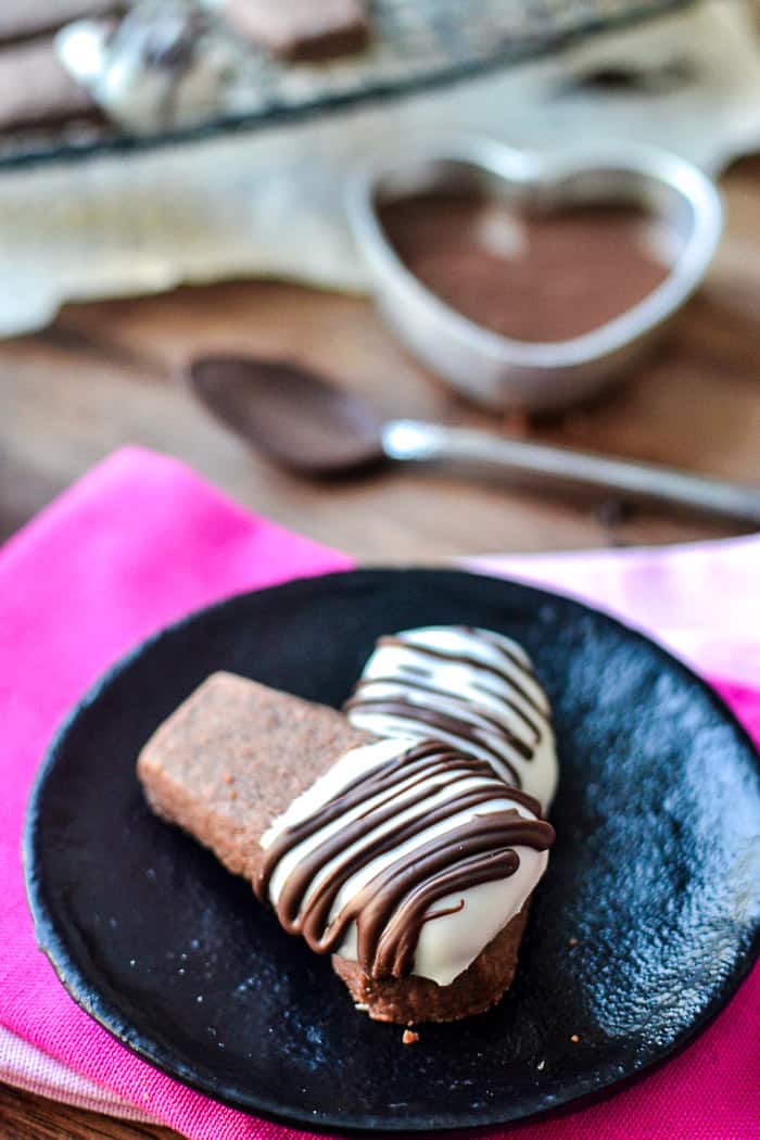 2 chocolate shortbread cookies on a plate