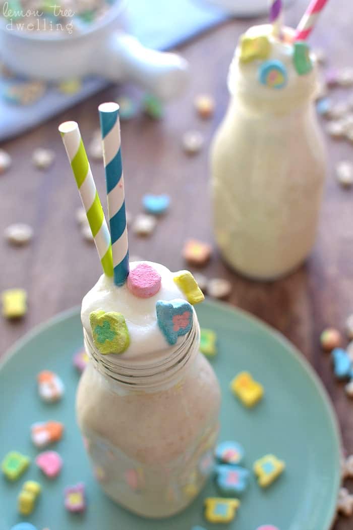 Lucky Charms Milkshake. Creamy vanilla ice cream blended with Lucky Charms and marshmallow fluff and topped with whipped cream and Lucky Charms marshmallows!