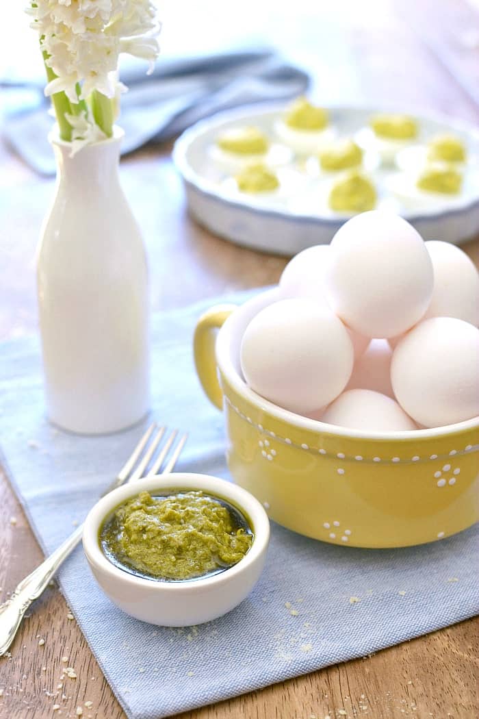 Parmesan Pesto Deviled Eggs are a easy and delicious protein snack or breakfast treat for Easter. These 5-ingredient deviled eggs are flavored with a touch of lemon and a big burst of flavor!
