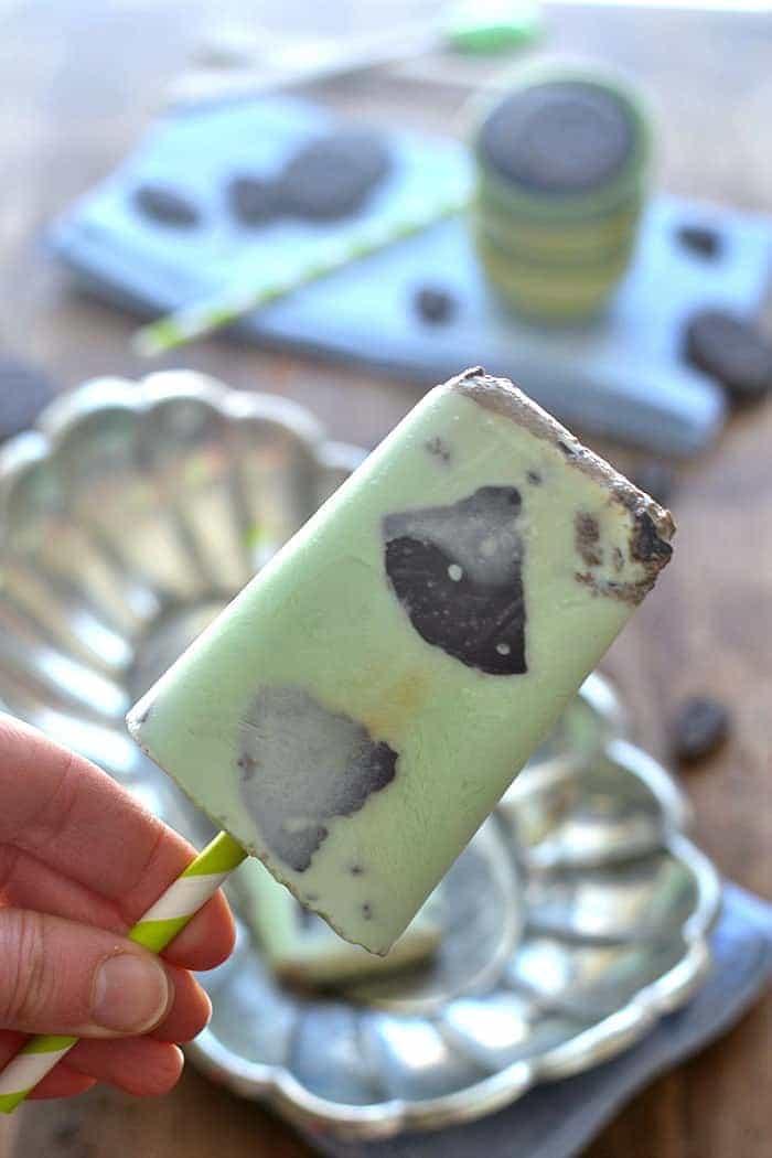  Creamy, delicious Thin Mint Ice Cream Popsicles are made with fresh cream and real Thin Mint Girl Scout cookies! 