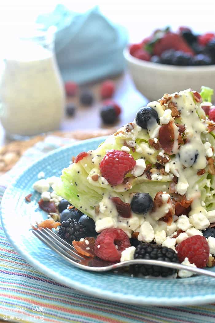 Berry Wedge Salad - 3 kinds of berries, bacon, pecans, goat cheese, and creamy poppy seed dressing