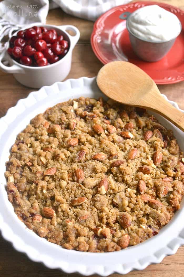  Homemade Cherry Crisp, packed with almonds and topped with a thick layer of crunchy brown sugar streusel. Serve it with homemade amaretto whipped cream for an extra special treat!