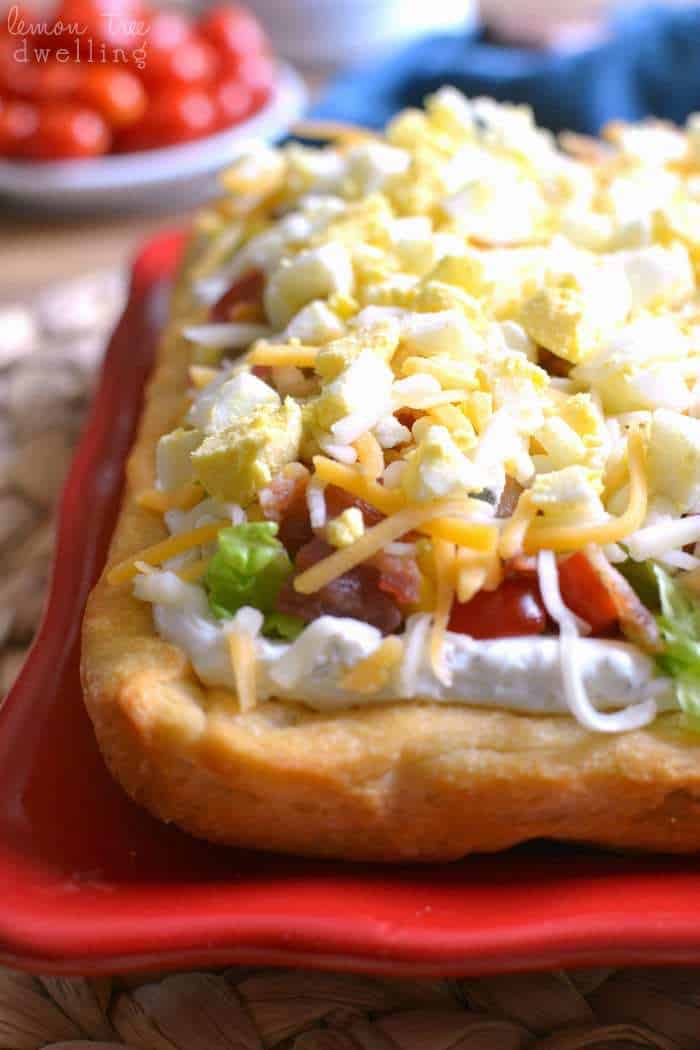 Cobb Crescent Roll Pizza - all the flavors of Cobb Salad on a buttery crescent roll crust! These pizza squares make a perfect appetizer for any get together!