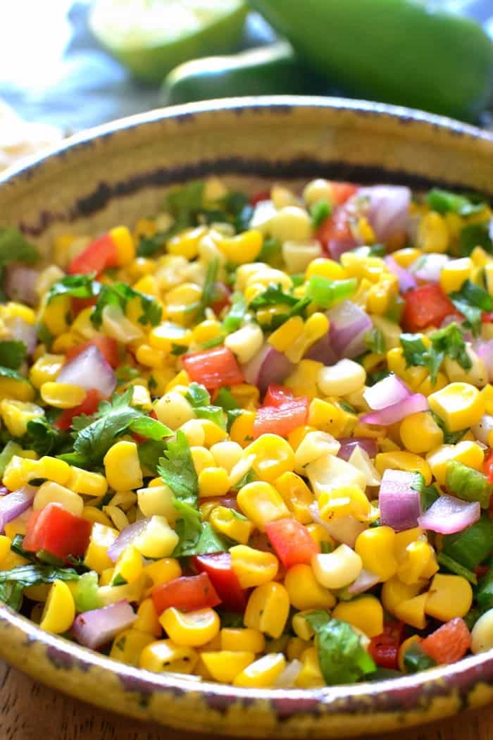 Fresh Corn Salsa - made with just 7 simple ingredients and perfect for dipping, topping, or eating by the spoonful! 