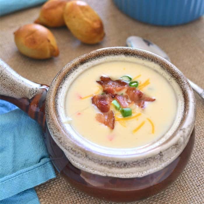The BEST EVER White Cheddar Beer Cheese Soup! This soup is packed with flavor, easy to make, and perfect for the cold months ahead! 