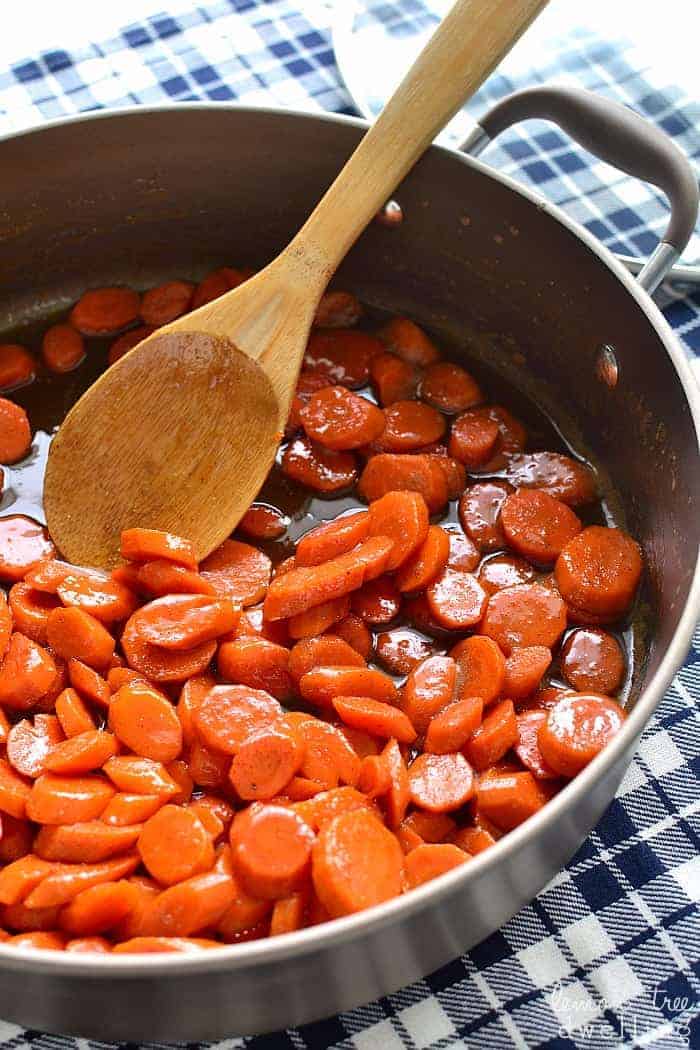 These Brown Sugar Glazed Carrots soar to a whole new level! Made with just 4 ingredients, they come together quickly and make the perfect holiday side dish!