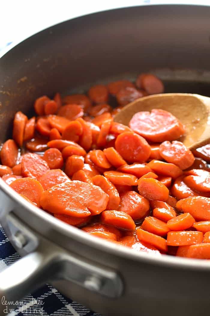 Close up of glazed carrots in pan