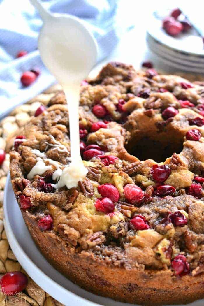 This Cranberry-Pecan Coffee Cake is packed with fresh cranberries, pecans, and brown sugar streusel, then topped with a creamy vanilla glaze. Serve it for breakfast or dessert....either way, it's perfect for the holidays!