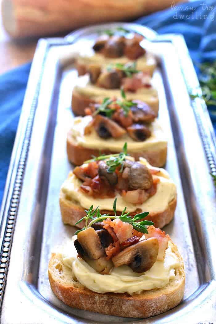 This Mushroom Bacon Swiss Crostini is packed with delicious flavor and so simple to make! The perfect holiday appetizer - it's sure to please a crowd!