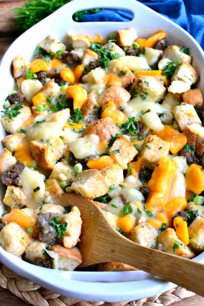  This Poutine Stuffing is packed full of pork sausage and cheese curds and topped with a delicious poutine gravy. It's such a fun twist on a classic - perfect for Thanksgiving!