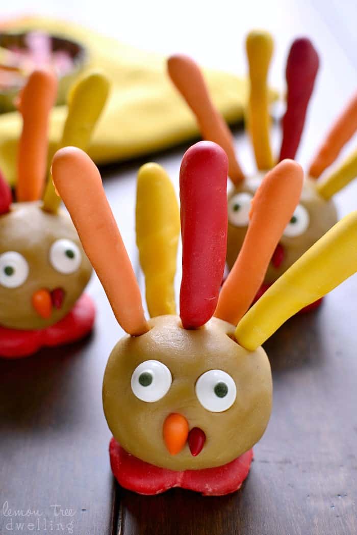 These Thanksgiving Cookie Dough Turkeys are simple, delicious, and SO fun for Thanksgiving! They're perfect for a class party or Thanksgiving dinner, and best of all, the kids can help you make them!