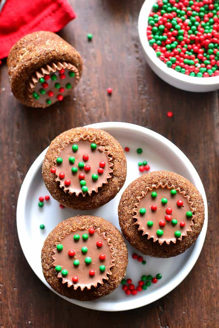 Peanut Butter Cup Stuffed Ginger Cookies are deliciously sweet with an unexpected twist! The perfect addition to your holiday cookie plate!