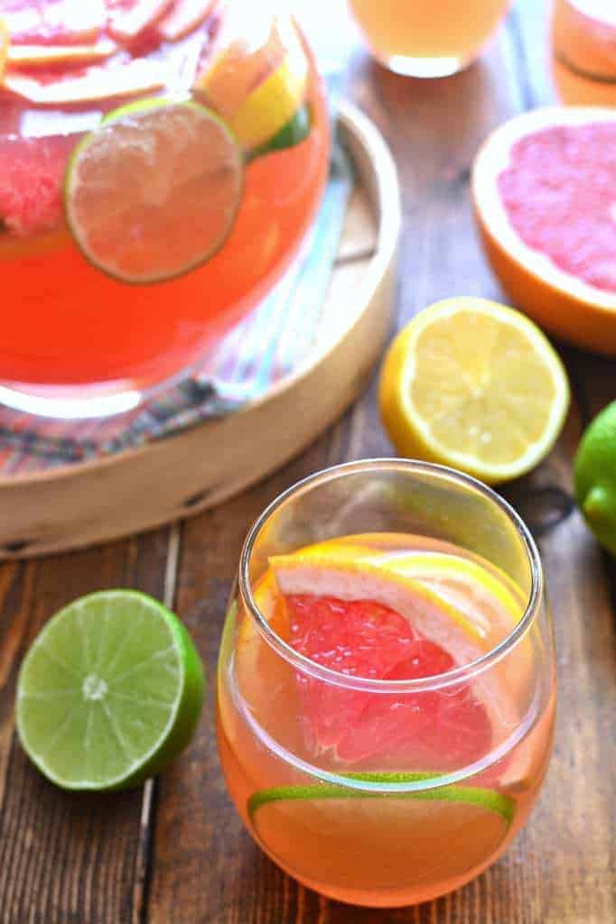 Delicious Citrus Sangria is made with just 4 simple ingredients and loaded with fresh citrus fruit. Perfectly refreshing any time of year!