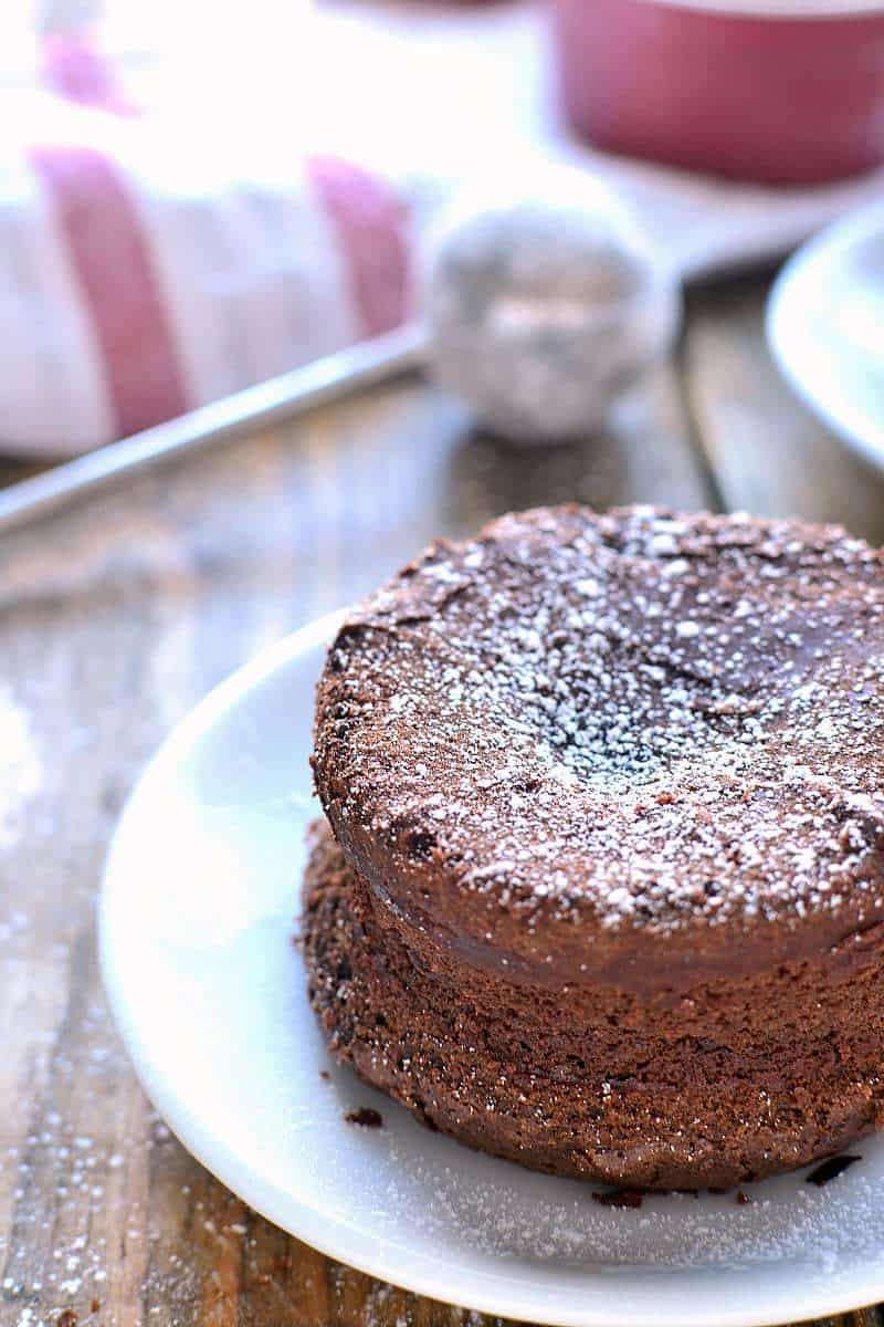  Chocolate Peanut Butter Lava Cakes combine two classic flavors in one deliciously ooey gooey dessert. Perfect for Valentine's Day or any special occasion!