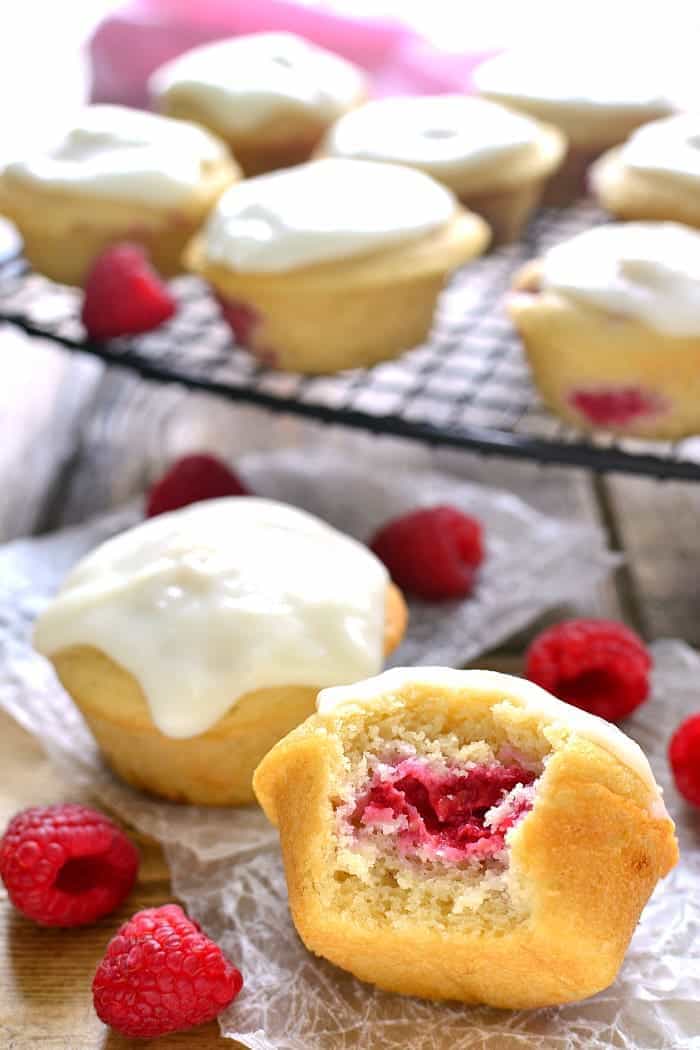 These Iced Raspberry Muffins are loaded with fresh raspberries and topped with a deliciously sweet cream cheese icing. The perfect way to start  your day!