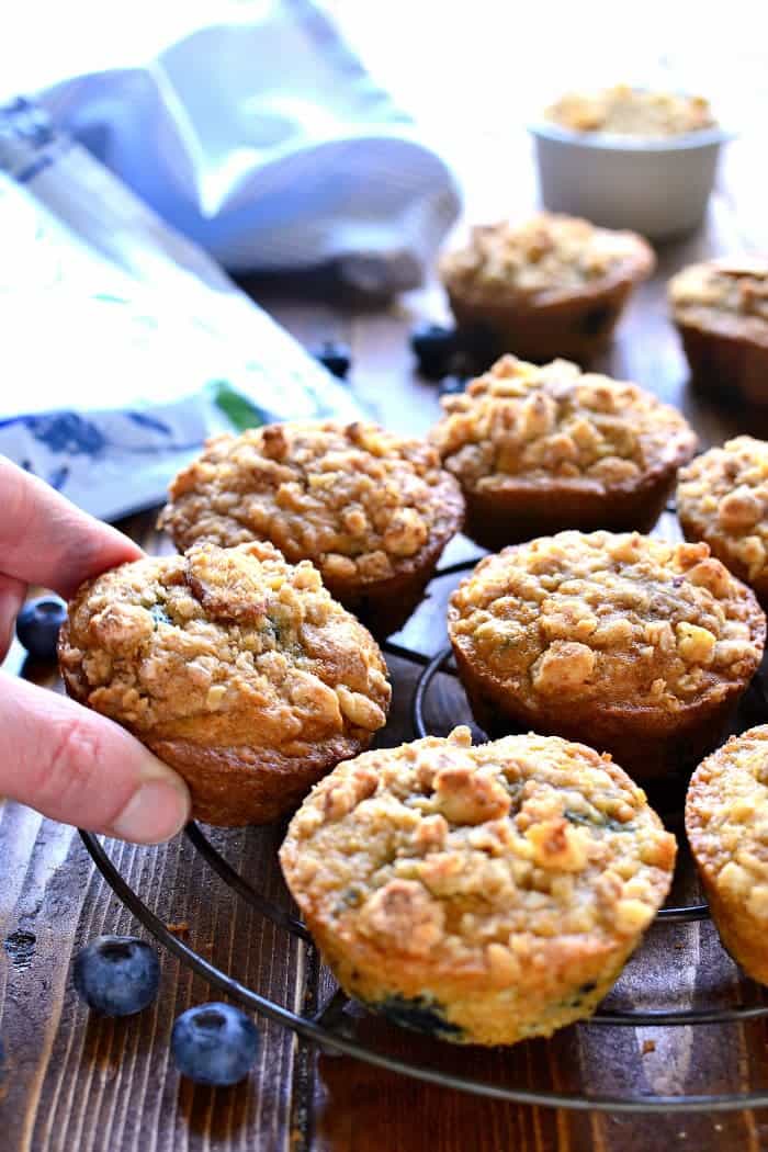 Blueberry Muffins get a makeover with the delicious addition of granola! These Blueberry Granola Muffins are packed with sweet blueberries and vanilla almond granola, then topped with granola streusel for a crunchy finish. Sure to become a family favorite!