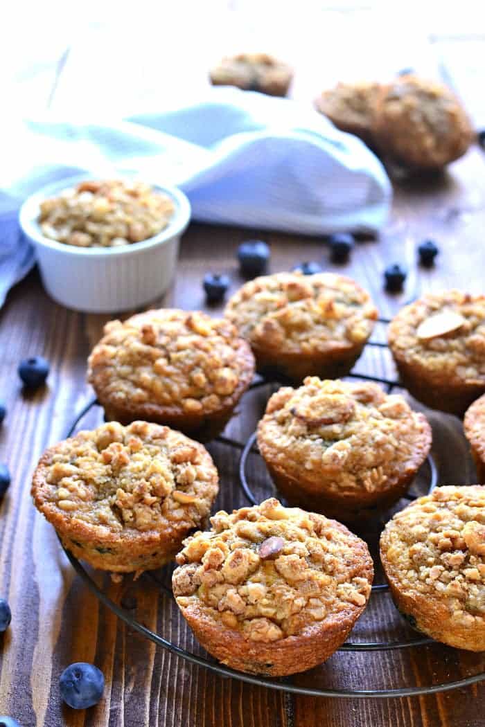 Blueberry Muffins get a makeover with the delicious addition of granola! These Blueberry Granola Muffins are packed with sweet blueberries and vanilla almond granola, then topped with granola streusel for a crunchy finish. Sure to become a family favorite!