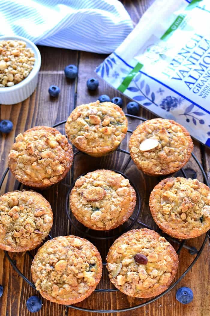 Blueberry Muffins get a makeover with the delicious addition of granola! These Blueberry Granola Muffins are packed with sweet blueberries and vanilla almond granola, then topped with granola streusel for a crunchy finish. Sure to become a family favorite!