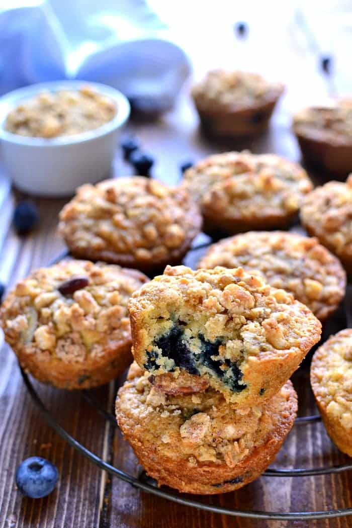 Blueberry Muffins get a makeover with the delicious addition of granola! These Blueberry Granola Muffins are packed with sweet blueberries and vanilla almond granola, then topped with granola streusel for a crunchy finish. Sure to become a family favorite!