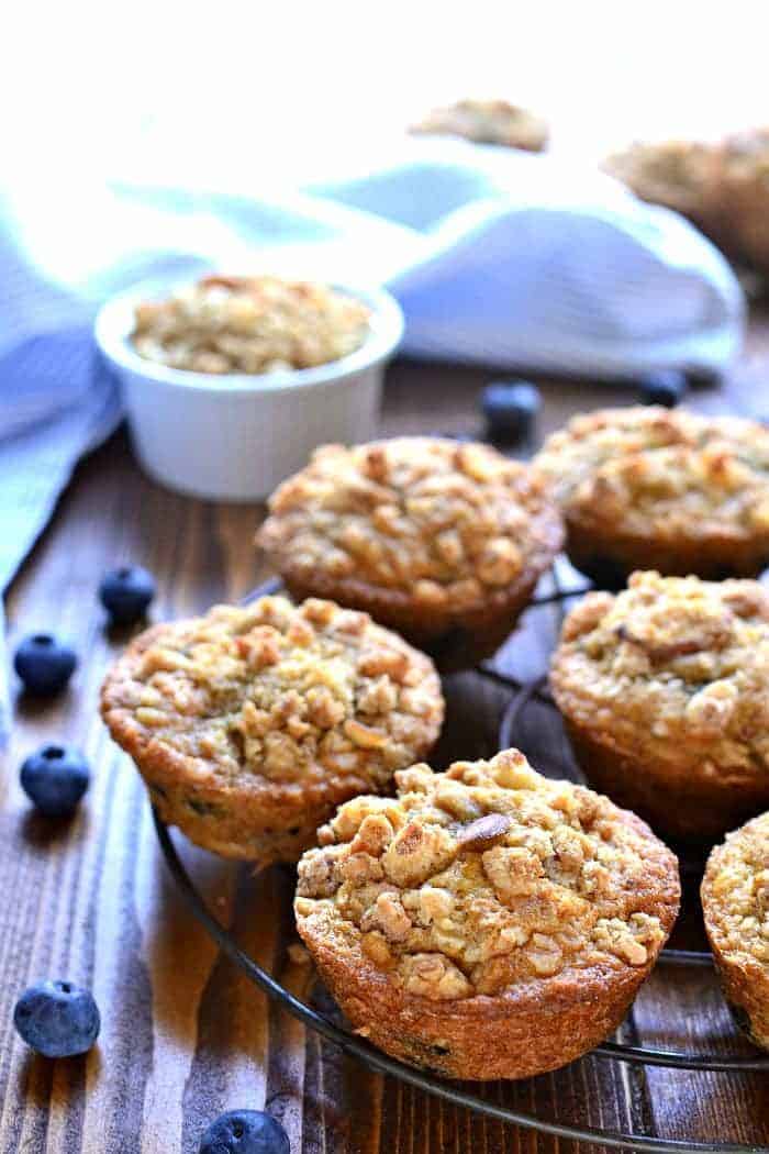 Blueberry Muffins get a makeover with the delicious addition of granola! These Blueberry Granola Muffins are packed with sweet blueberries and vanilla almond granola, then topped with granola streusel for a crunchy finish. Sure to become a family favorite!