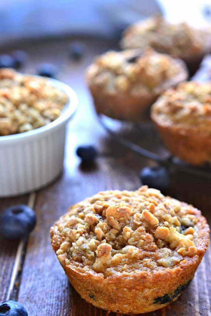 Blueberry Muffins get a makeover with the delicious addition of granola! These Blueberry Granola Muffins are packed with sweet blueberries and vanilla almond granola, then topped with granola streusel for a crunchy finish. Sure to become a family favorite!