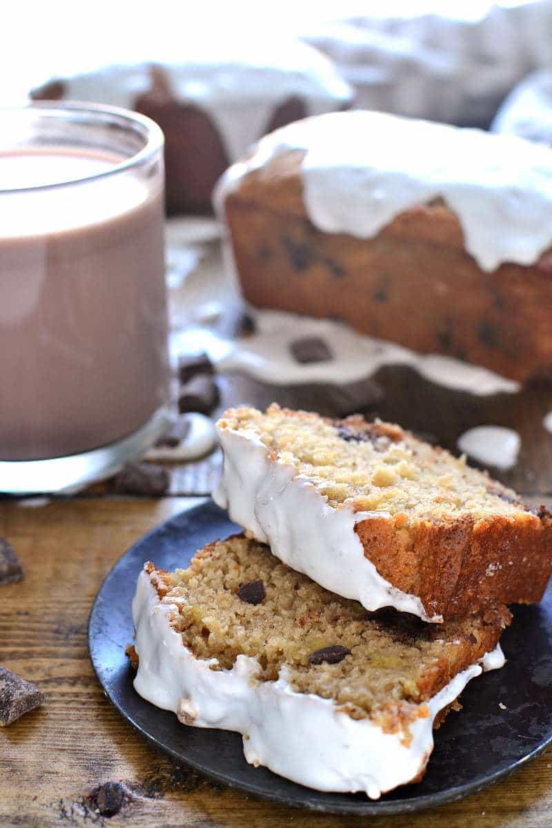 This Hot Chocolate Banana Bread takes your favorite breakfast treat to the next level! It's infused with rich chocolate flavor and topped with a sweet, gooey marshmallow drizzle. So you can drink your hot chocolate...and eat it, too!