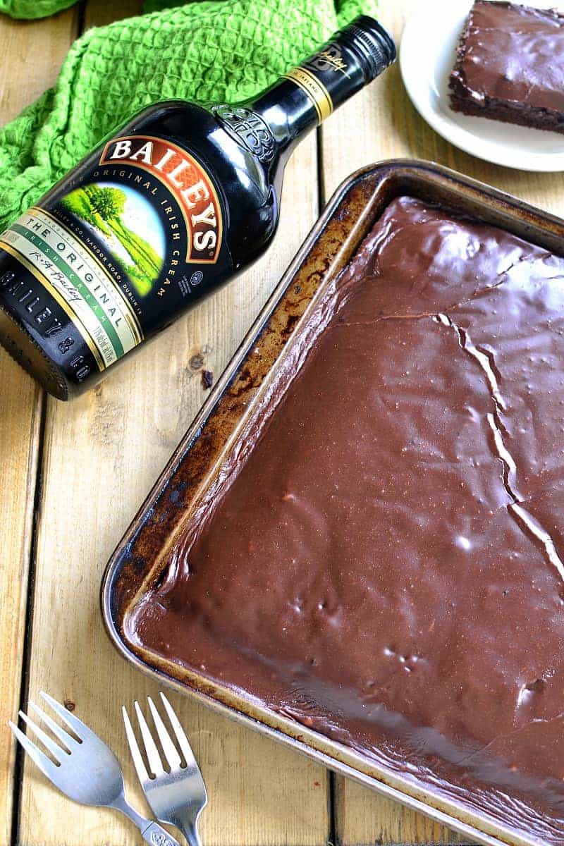 This Baileys Chocolate Sheet Cake has everything you could want - Baileys, chocolate, and cake! It's moist, rich, and packed with delicious Baileys flavor....perfect for St. Patrick's Day or summer picnics! This cake feeds a crowd!