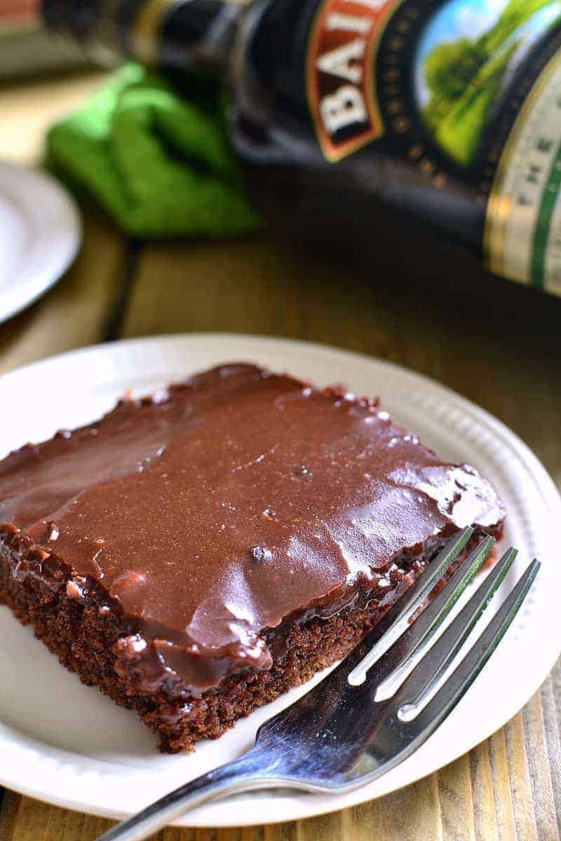 This Baileys Chocolate Sheet Cake has everything you could want - Baileys, chocolate, and cake! It's moist, rich, and packed with delicious Baileys flavor....perfect for St. Patrick's Day or summer picnics! This cake feeds a crowd!