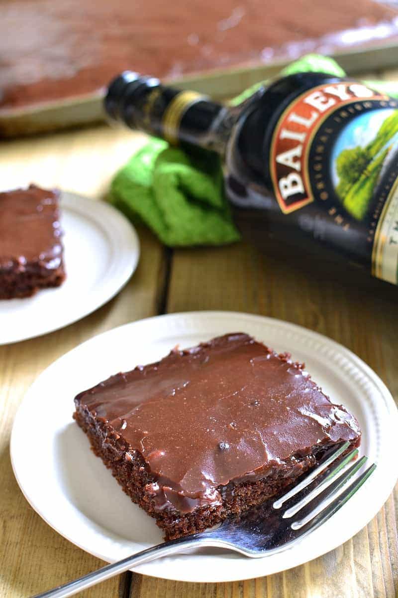 This Baileys Chocolate Sheet Cake has everything you could want - Baileys, chocolate, and cake! It's moist, rich, and packed with delicious Baileys flavor....perfect for St. Patrick's Day or summer picnics! This cake feeds a crowd!