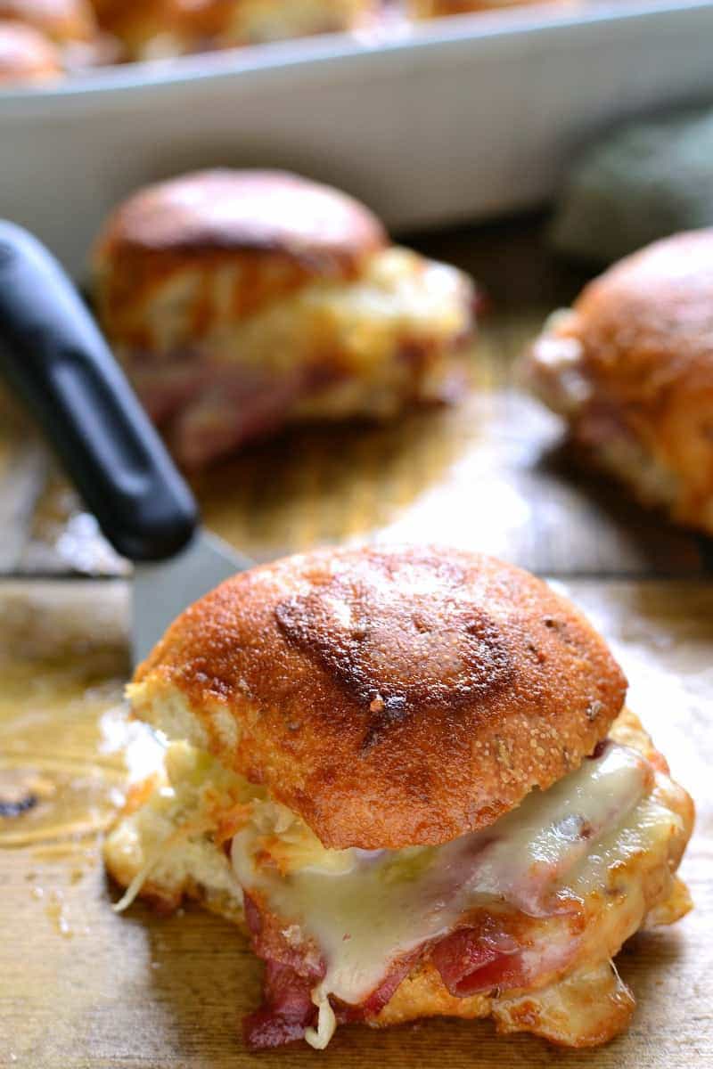 These Baked Reuben Sandwiches combine all the flavors of a classic Reuben with a delicious sauce that's baked right in! Perfect for St. Patrick's Day or all year round, and great for feeding a crowd!