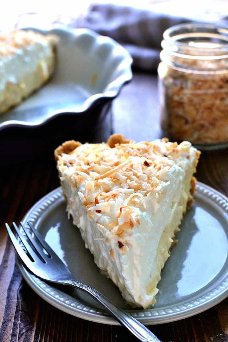 This Coconut Cream Pie is smooth and luscious and creamy....and filled with the delicious flavors of toasted coconut and vanilla. Perfect for Easter, perfect for spring, the perfect piece of pie!