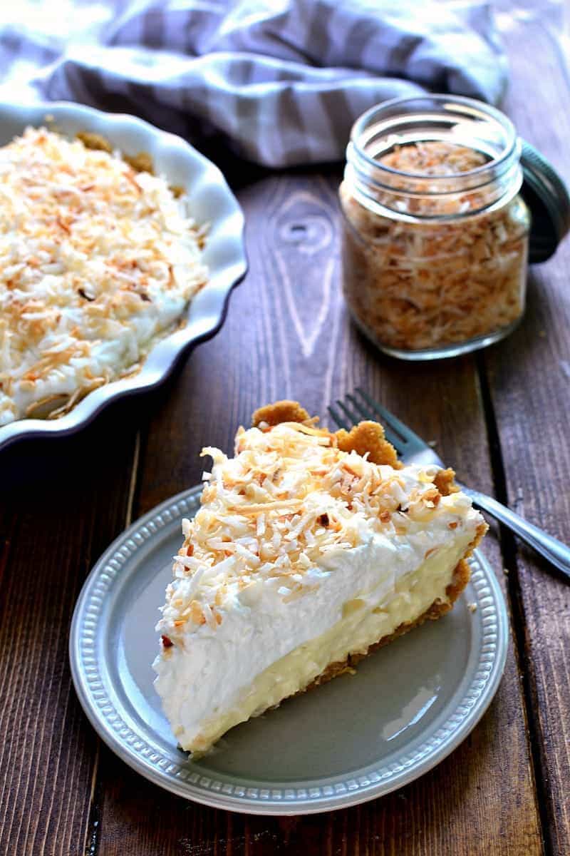 This Coconut Cream Pie is smooth and luscious and creamy....and filled with the delicious flavors of toasted coconut and vanilla. Perfect for Easter, perfect for spring, the perfect piece of pie!