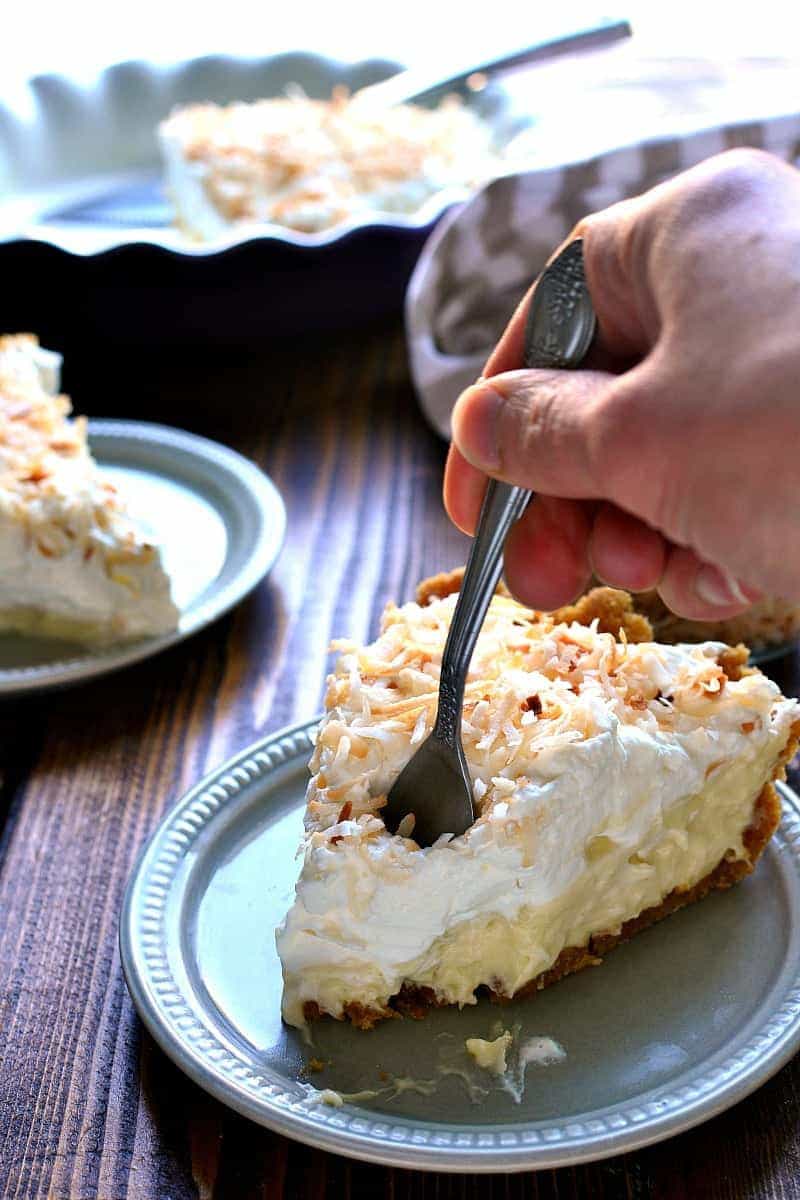 This Coconut Cream Pie is smooth and luscious and creamy....and filled with the delicious flavors of toasted coconut and vanilla. Perfect for Easter, perfect for spring, the perfect piece of pie!