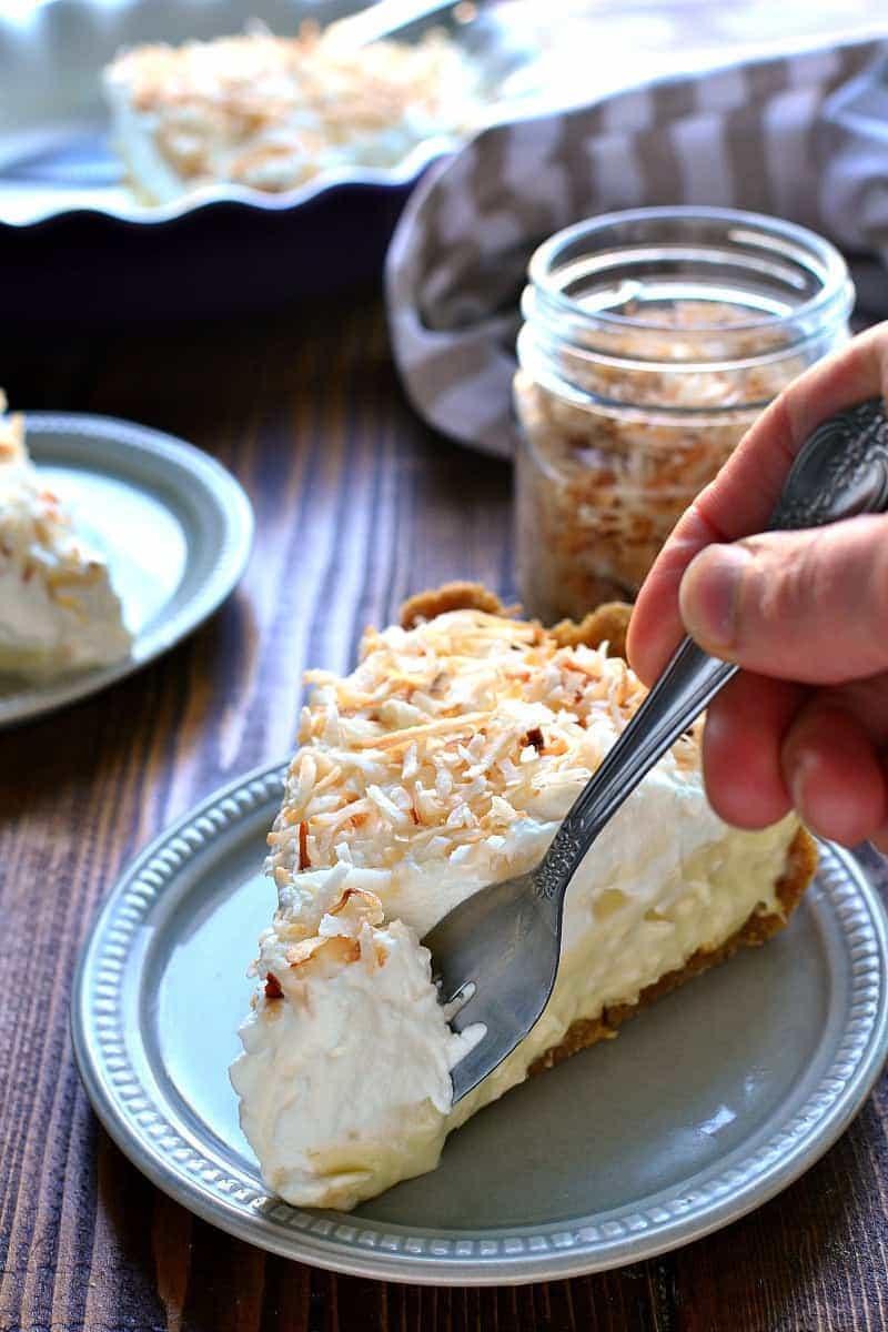 This Coconut Cream Pie is smooth and luscious and creamy....and filled with the delicious flavors of toasted coconut and vanilla. Perfect for Easter, perfect for spring, the perfect piece of pie!