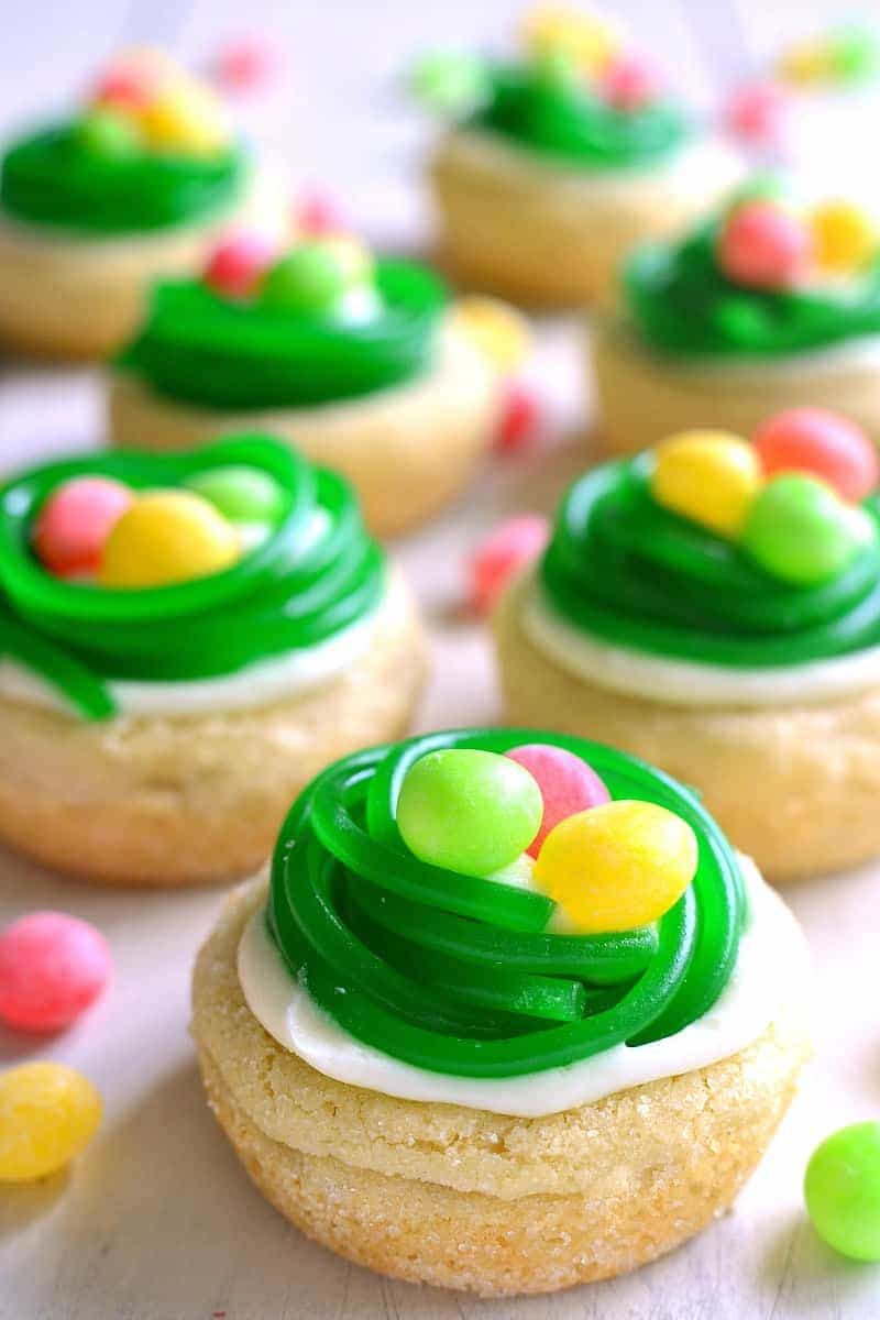 These Easter Egg Cookie Cups are easy, adorable, and so delicious! Made with sugar cookie dough, lemon buttercream, and 2 types of Easter candy, they're the perfect addition to any spring celebration!