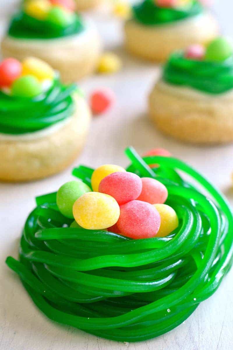 These Easter Egg Cookie Cups are easy, adorable, and so delicious! Made with sugar cookie dough, lemon buttercream, and 2 types of Easter candy, they're the perfect addition to any spring celebration!