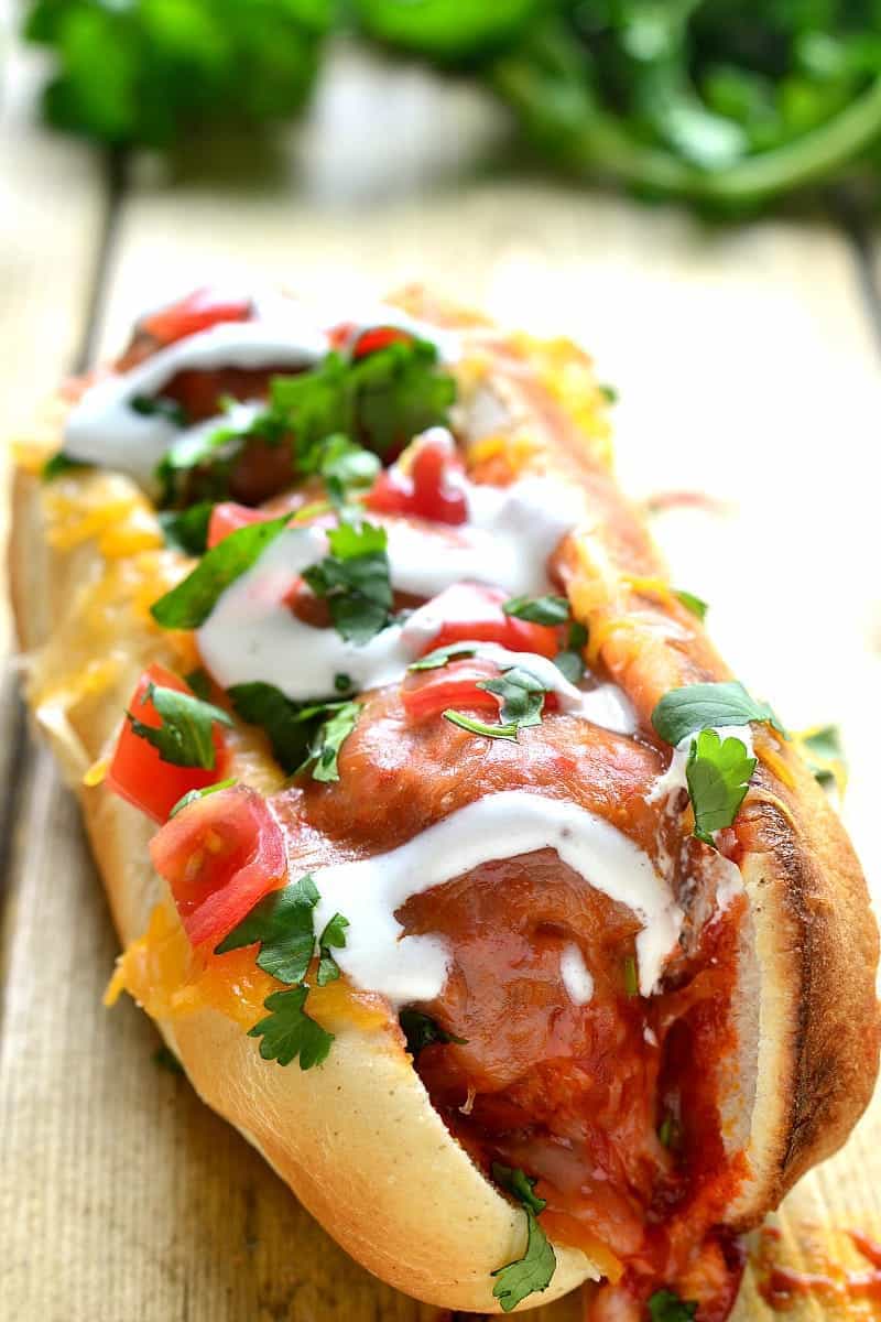 These Enchilada Meatball Subs combine two family favorites in one delicious dish that's easy to make and perfect for busy weeknights or game days!